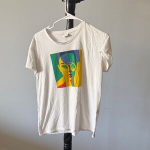 Vintage and Retro Graphic Tee with Colorful Face Design